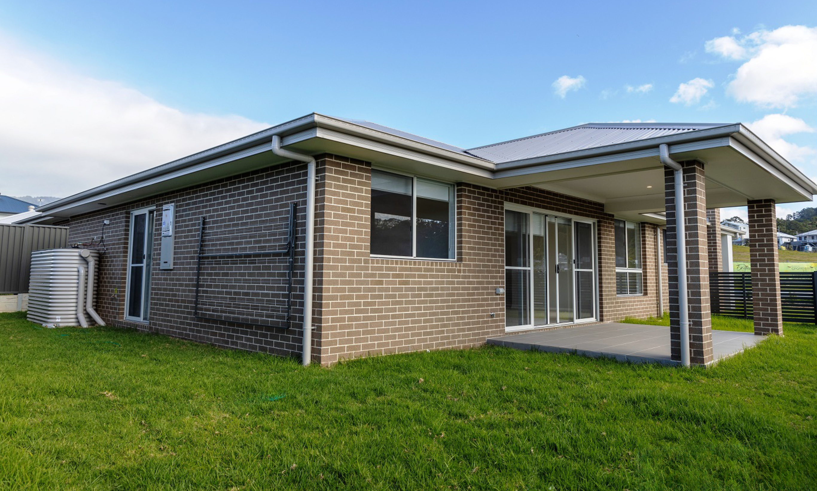 single-storey brick home with large backyard. 