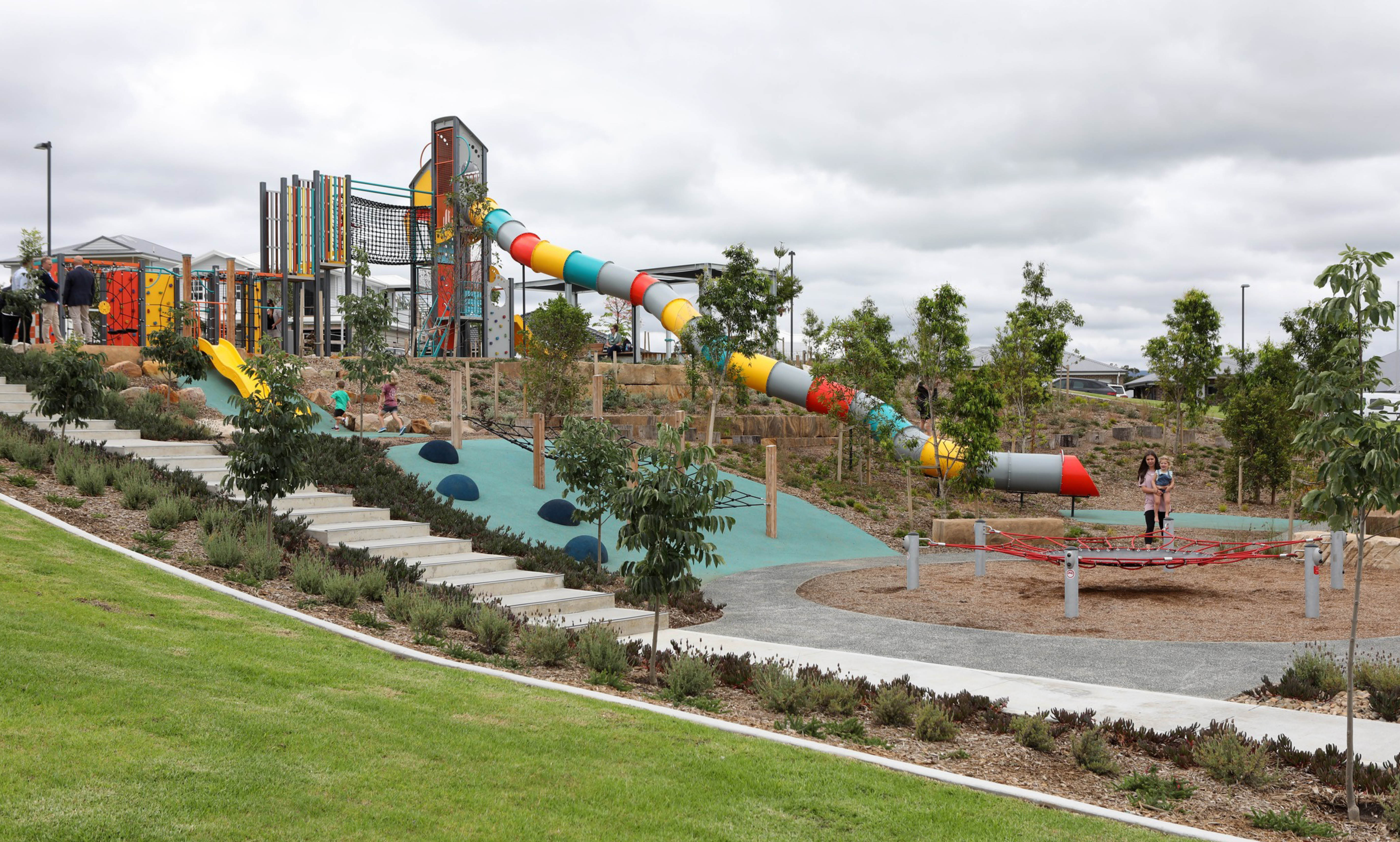 Large kids' playground at calderwood valley with slide, climbing gym and more
