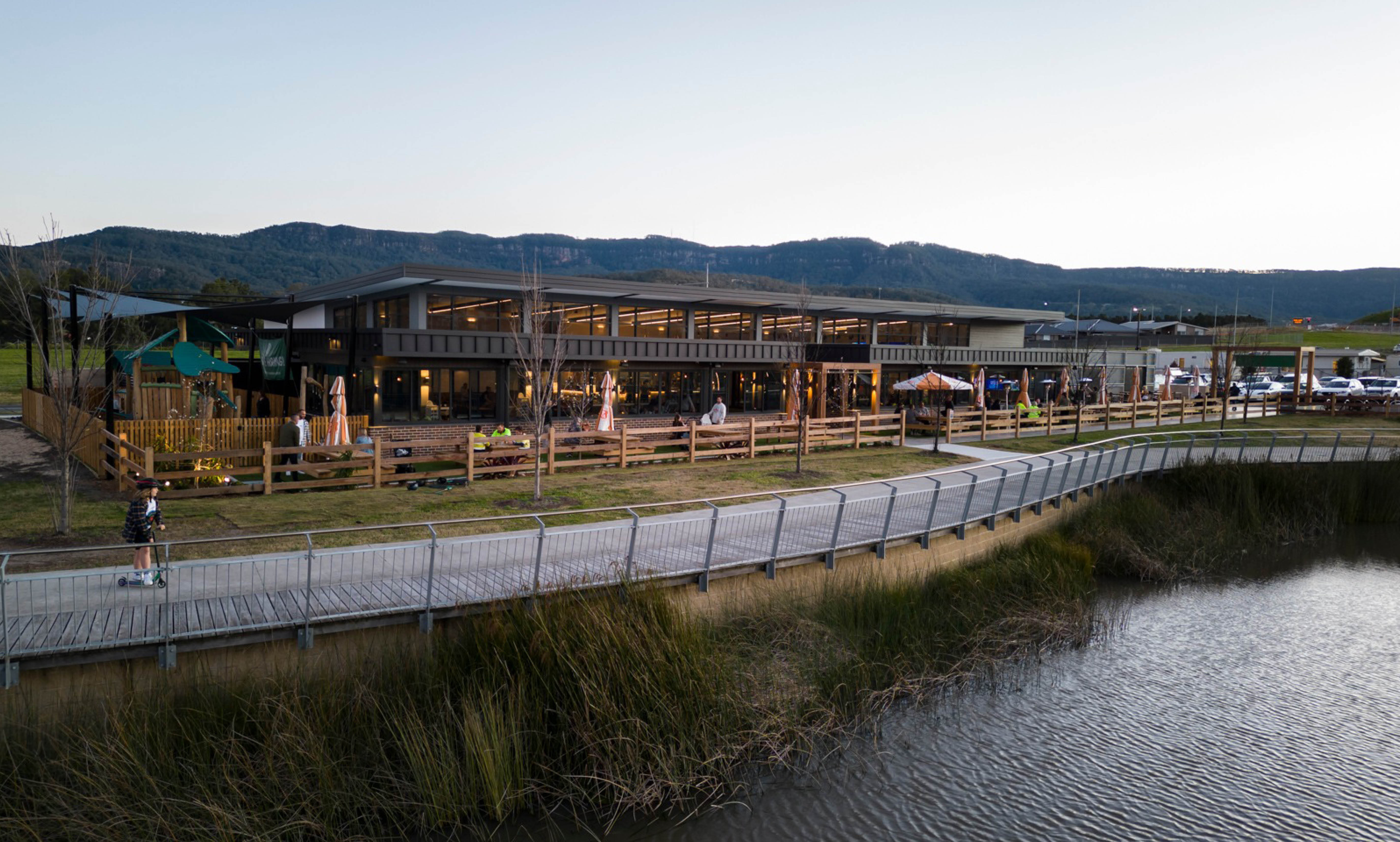 Plough & Ale pub at Calderwood Valley, sitting along creek.