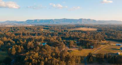 Countryside overlooking mountain ranges in the NSW Hunter Valley. 