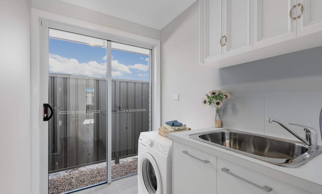 Laundry- Stoneleigh Home Design-Complete Homes 